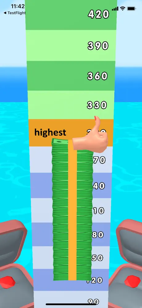 Game screenshot showing purple track with buildings